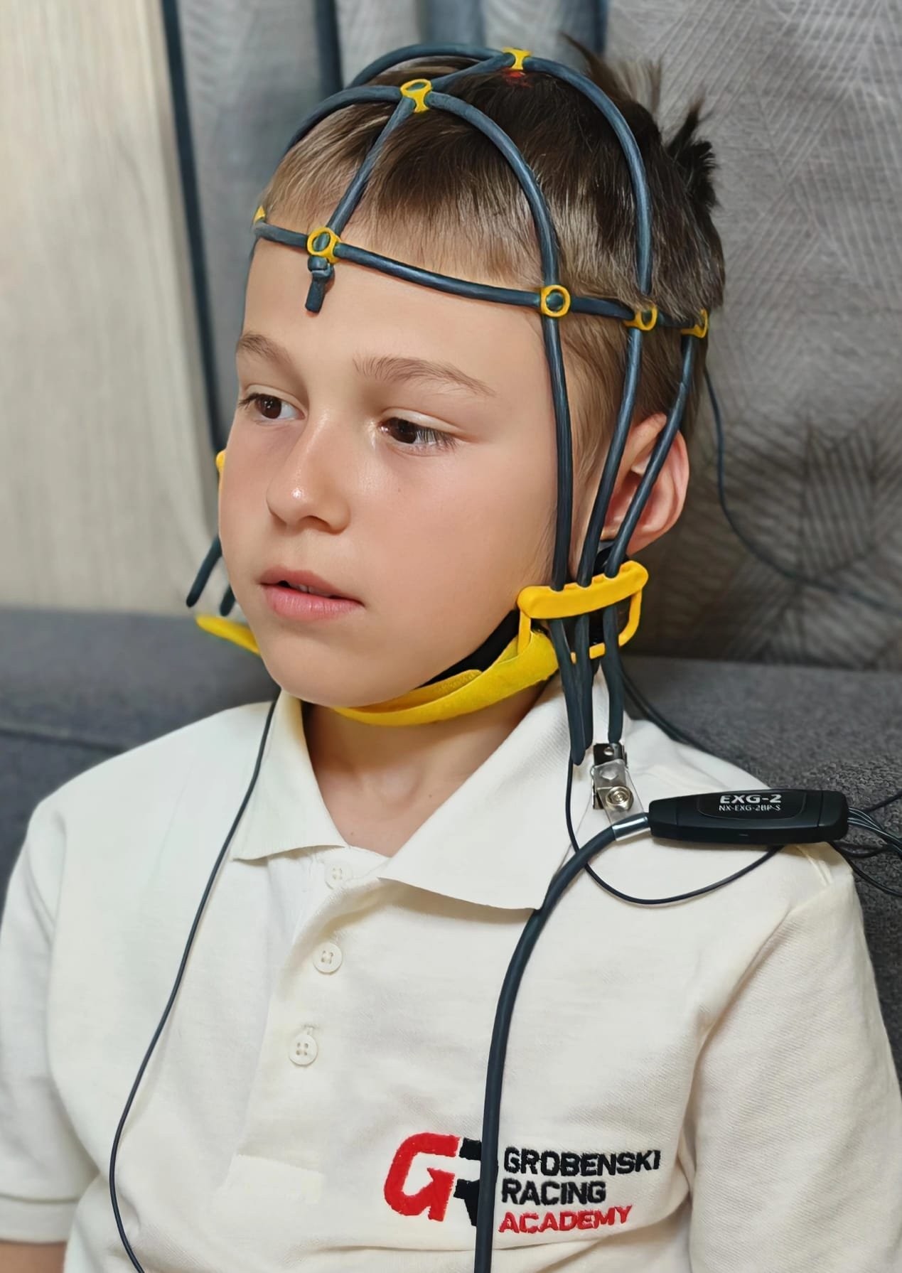 Young driver during a neurofeedback training session at Grobenski Racing Academy